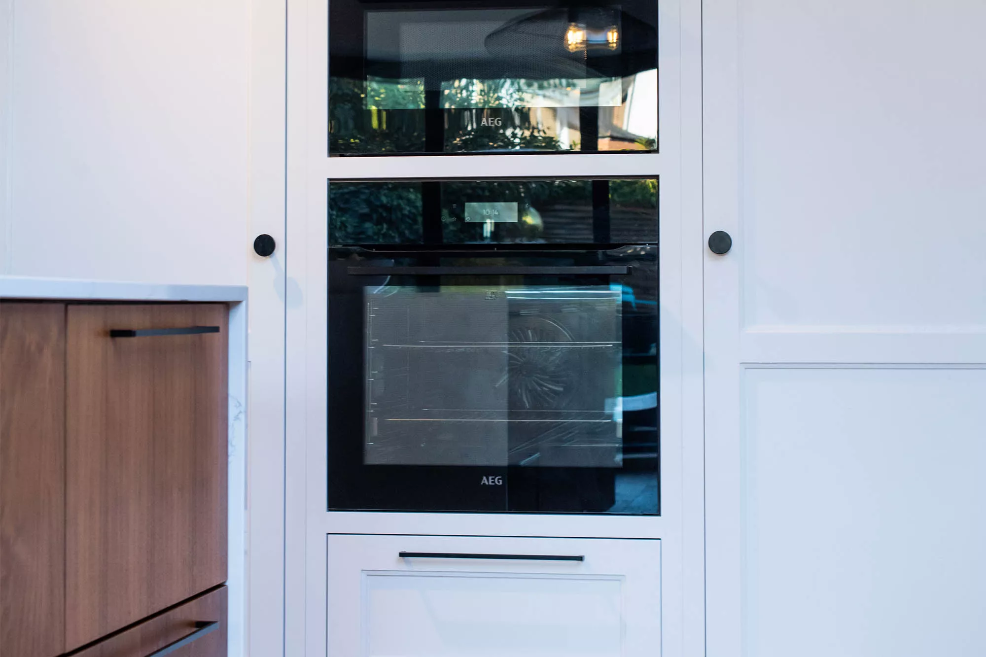 luxury white kitchen AEG appliances