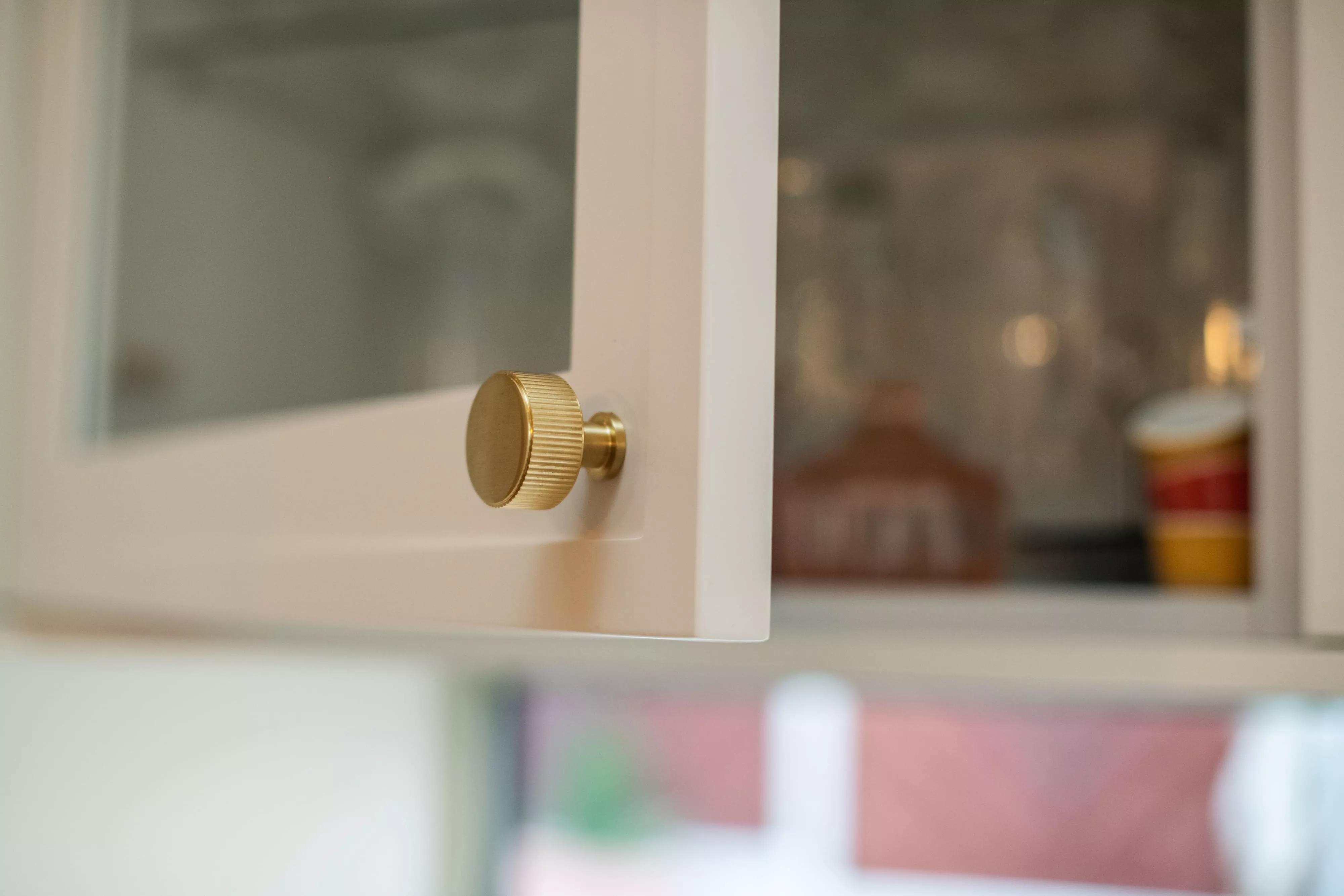 close up of brass handle on cupboard